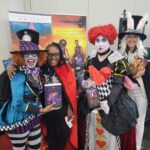 Readers enjoying a novel by African American fantasy and romance author N.D. Jones.