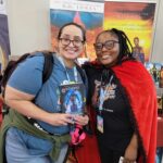 Reader enjoying a novel by African American fantasy and romance author N.D. Jones.