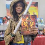 Reader enjoying a novel by African American fantasy and romance author N.D. Jones.