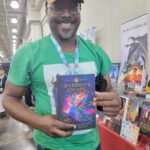 Reader enjoying a novel by African American fantasy and romance author N.D. Jones.