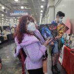 Reader enjoying a novel by African American fantasy and romance author N.D. Jones.