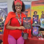 Reader enjoying a novel by African American fantasy and romance author N.D. Jones.