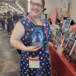 Reader enjoying a novel by African American fantasy and romance author N.D. Jones.
