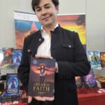 Reader enjoying a novel by African American fantasy and romance author N.D. Jones.