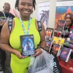 Reader enjoying a novel by African American fantasy and romance author N.D. Jones.