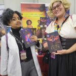 Readers enjoying a novel by African American fantasy and romance author N.D. Jones.