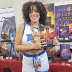 Reader enjoying a novel by African American fantasy and romance author N.D. Jones.