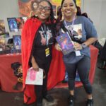 Reader enjoying a novel by African American fantasy and romance author N.D. Jones.