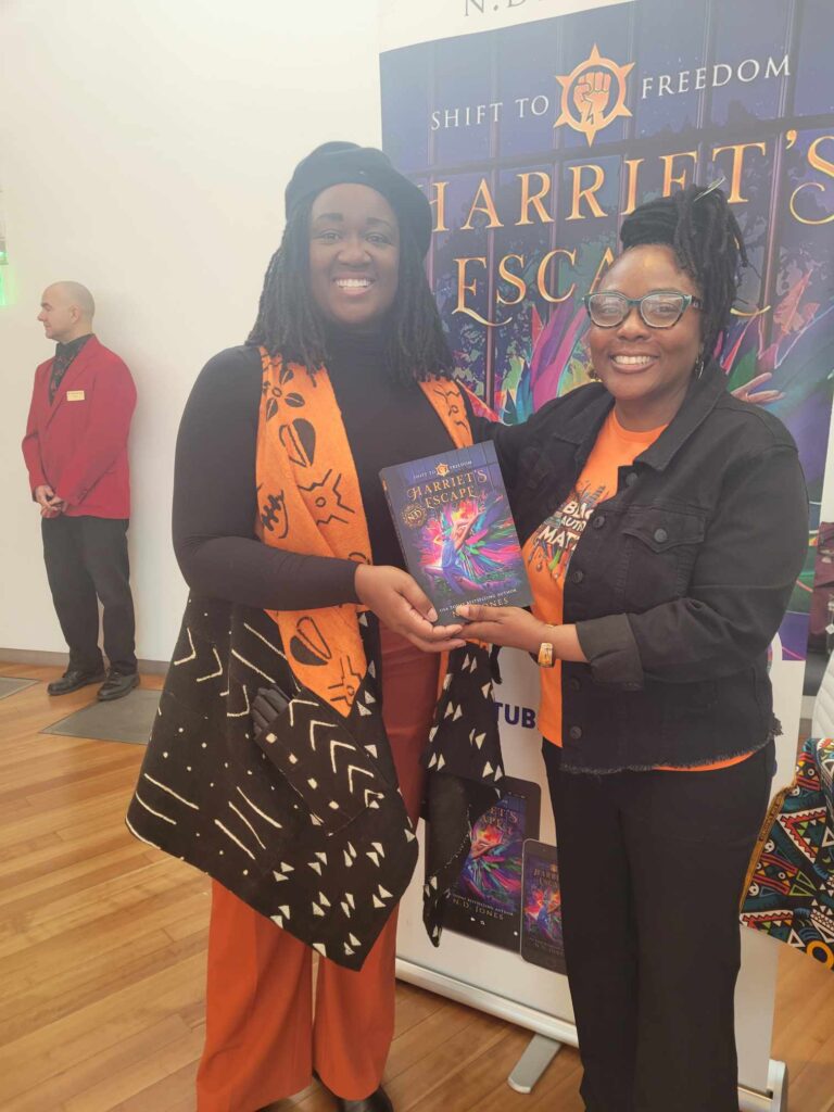 Reader enjoying a novel by African American fantasy and romance author N.D. Jones.