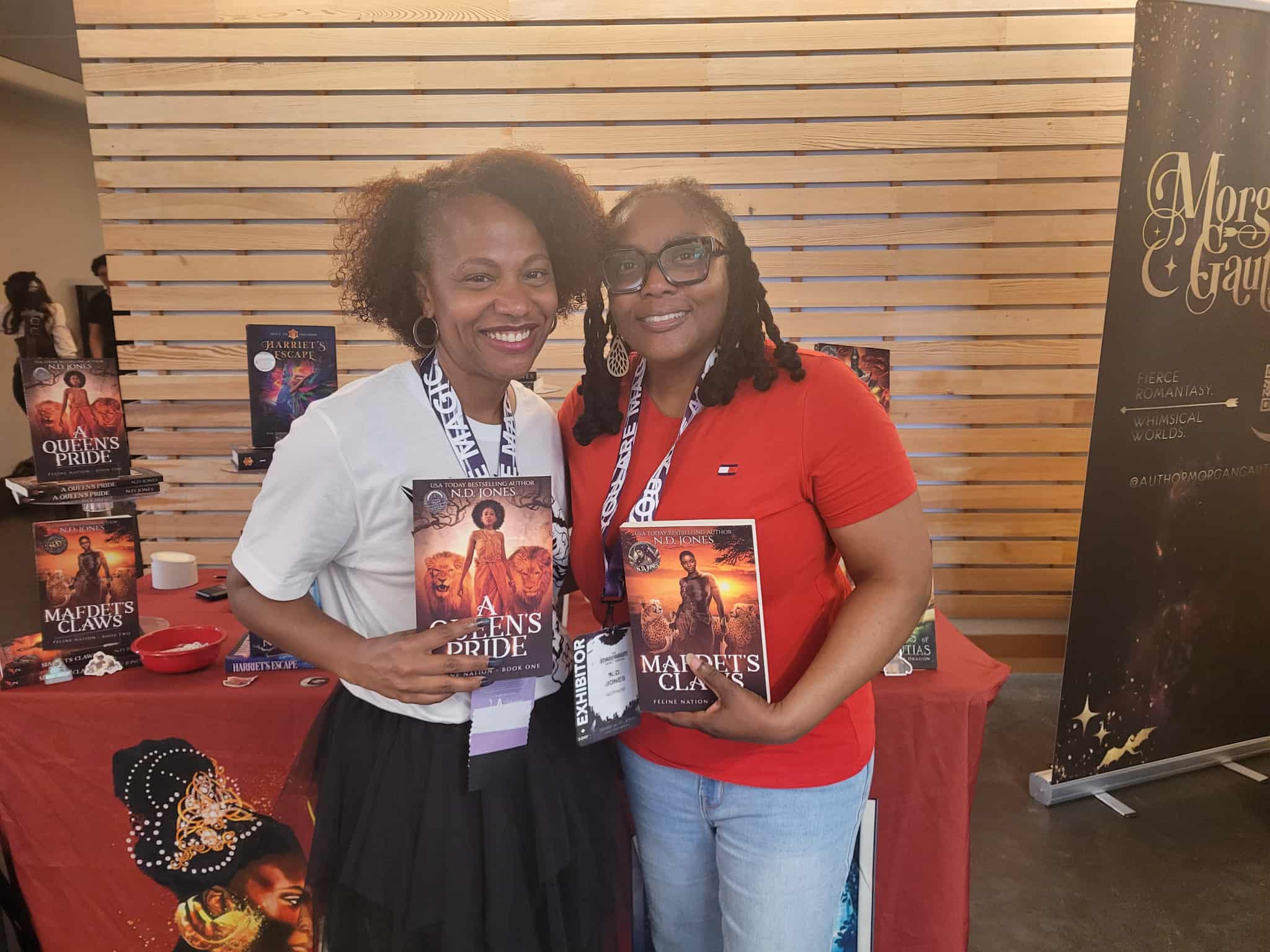 Reader enjoying a novel by African American fantasy and romance author N.D. Jones.