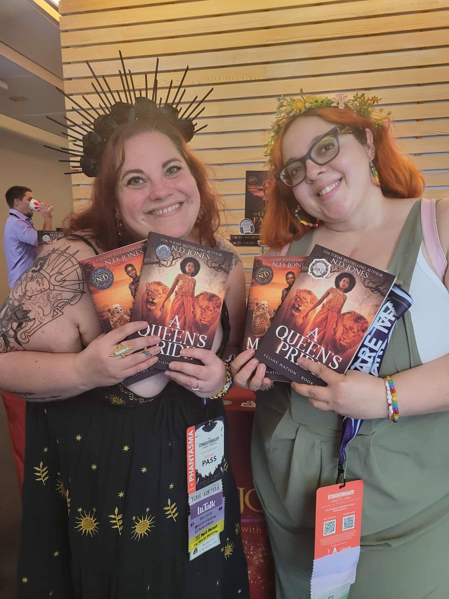 Readers enjoying a novel by African American fantasy and romance author N.D. Jones.